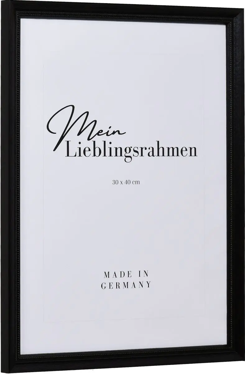 Seitenansicht eines kleinen, schwarzen, barocken Bilderrahmens