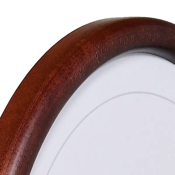 Ansicht der Ecke eines Ovalrahmens in der Farbe Mahagoni