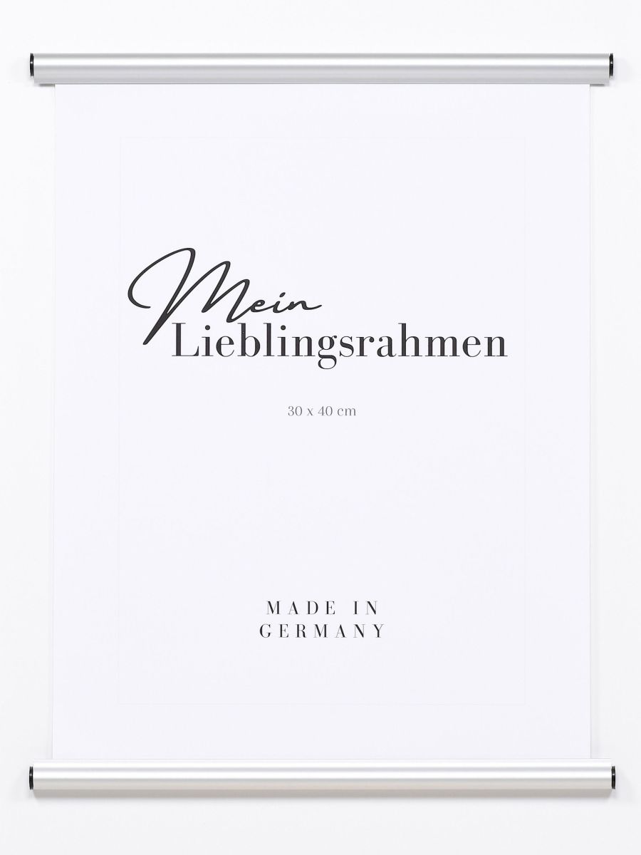 Frontansicht eine silbernen Alu-Posterhängers mit Klemmvorrichtung